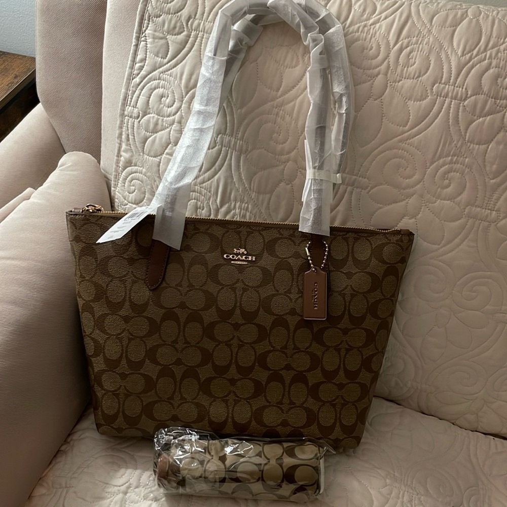Brand New Coach bag and matching umbrella. Has price tag & handle protectors on.